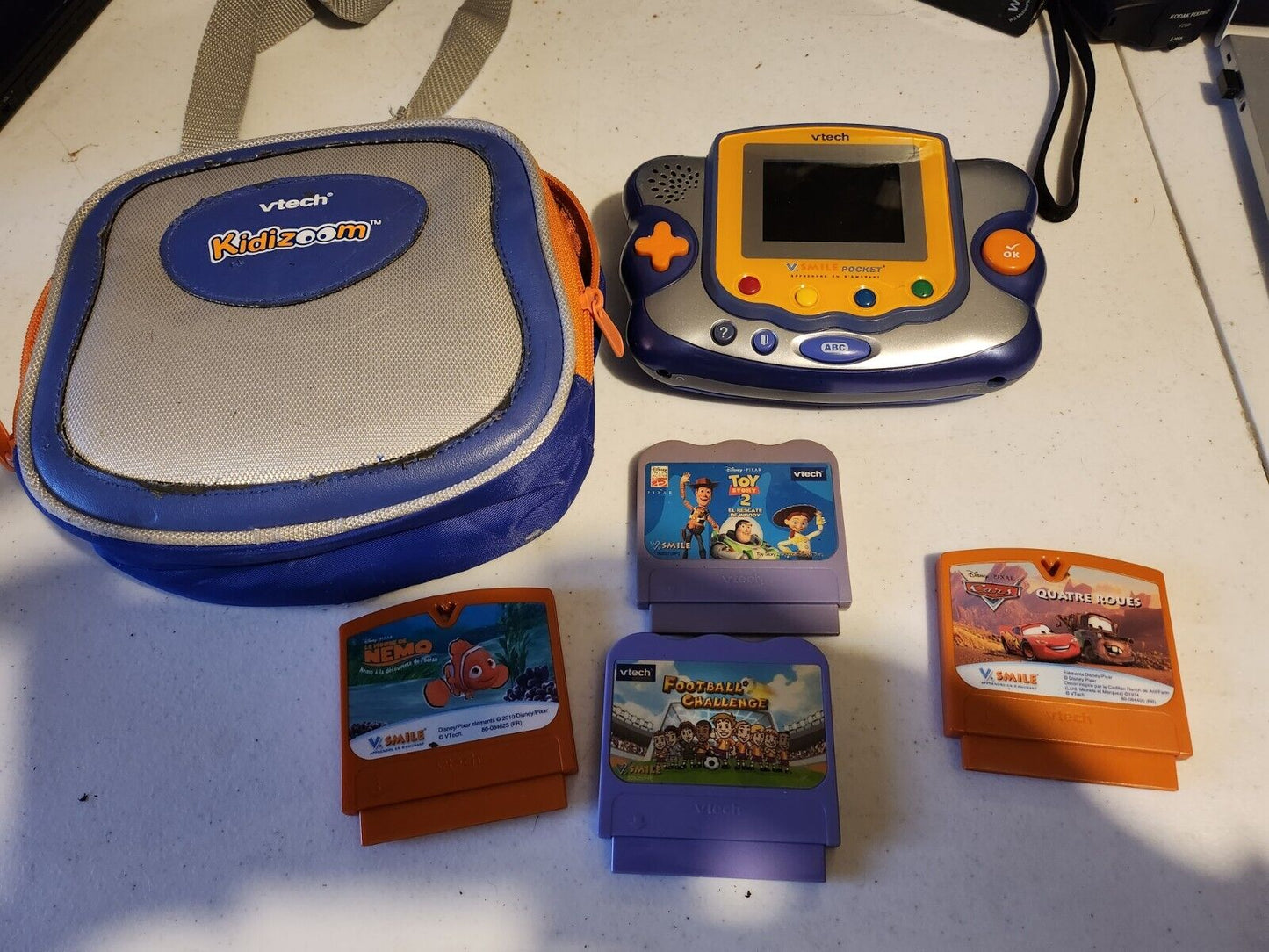 Lot Vsmile Pocket VTech + 4 Jeux