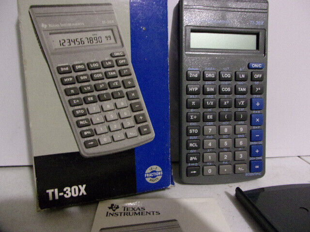 Calculatrice Texas instrument modèle TI-30X en boite notice